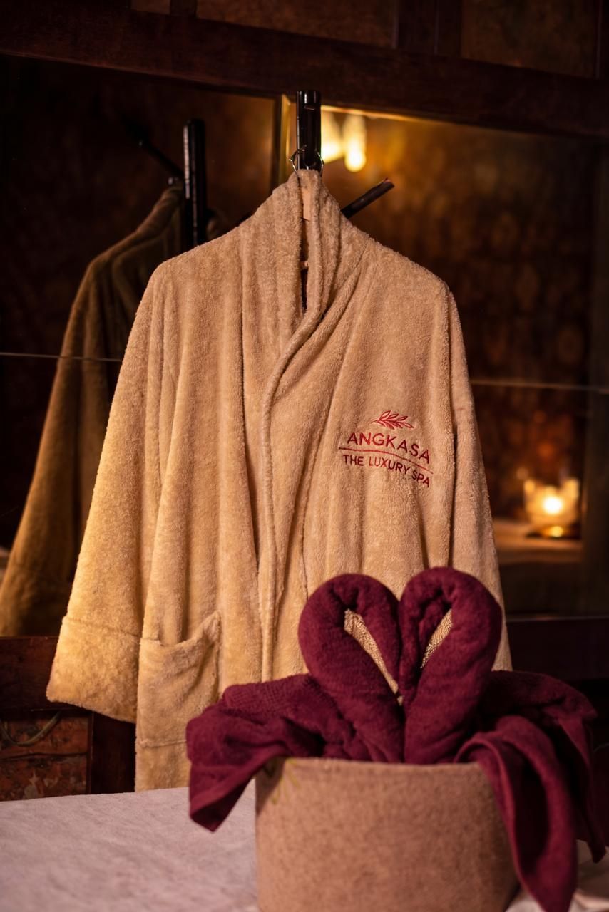 Robe and folded towels at Angkasa Wellness Spa