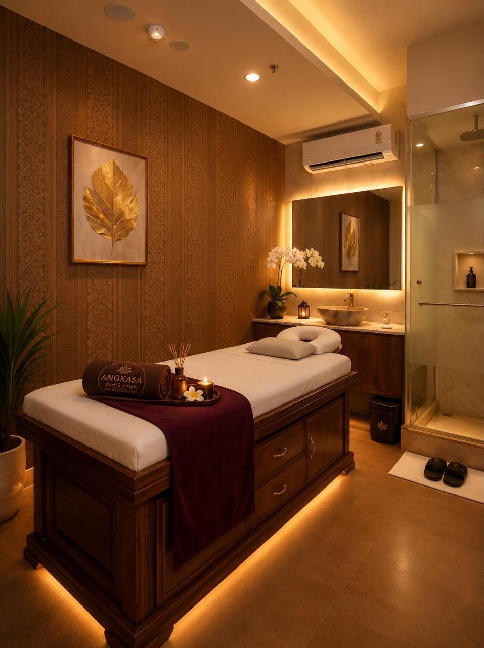 Treatment room with gold leaf art at Angkasa Wellness Spa